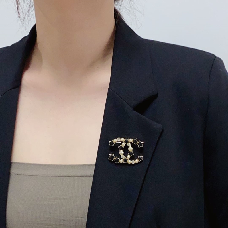 Ch**el brooches